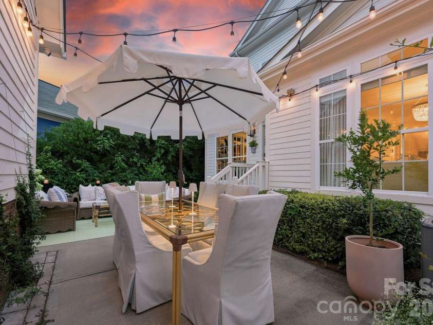 146 Lavender Bloom Loop, Mooresville, NC 28115.  MLS# CAR4406885, YatesRealty ID 39602. Courtyard at Twilight