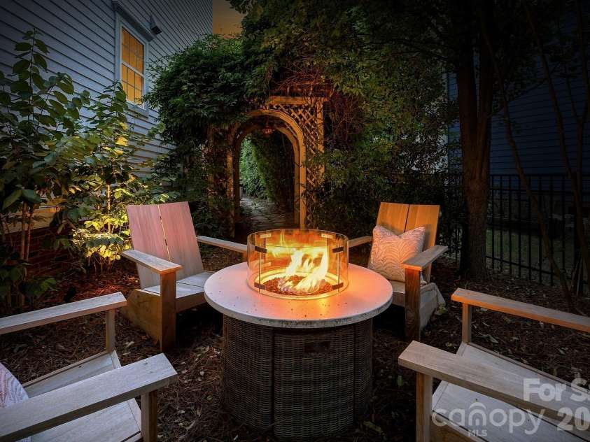 146 Lavender Bloom Loop, Mooresville, NC 28115.  MLS# CAR4406885, YatesRealty ID 39602. Side Yard at Night