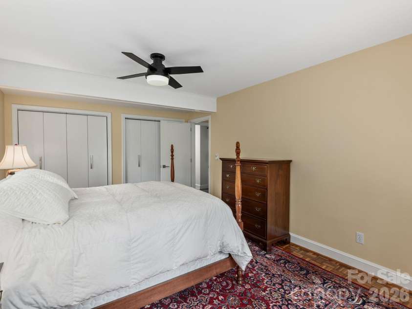 65 Cliff Drive, Laurel Park, NC 28739.  MLS# CAR4394753, YatesRealty ID 39607. A second view of the bedroom with dual closets