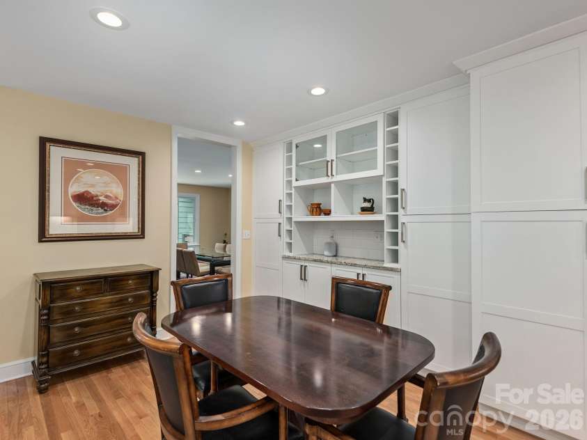 65 Cliff Drive, Laurel Park, NC 28739.  MLS# CAR4394753, YatesRealty ID 39607. Enjoy casual meals in the breakfast area, complete with a custom built-in buffet offering exceptional storage and display space
