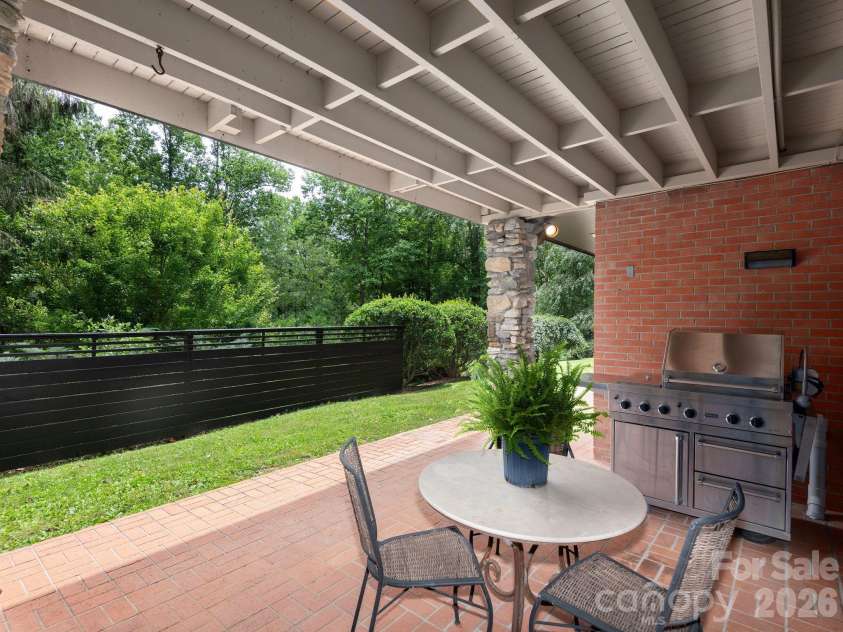 65 Cliff Drive, Laurel Park, NC 28739.  MLS# CAR4394753, YatesRealty ID 39607. Outdoor entertaining is easy with a covered patio    Outdoor entertaining is easy with a covered patio