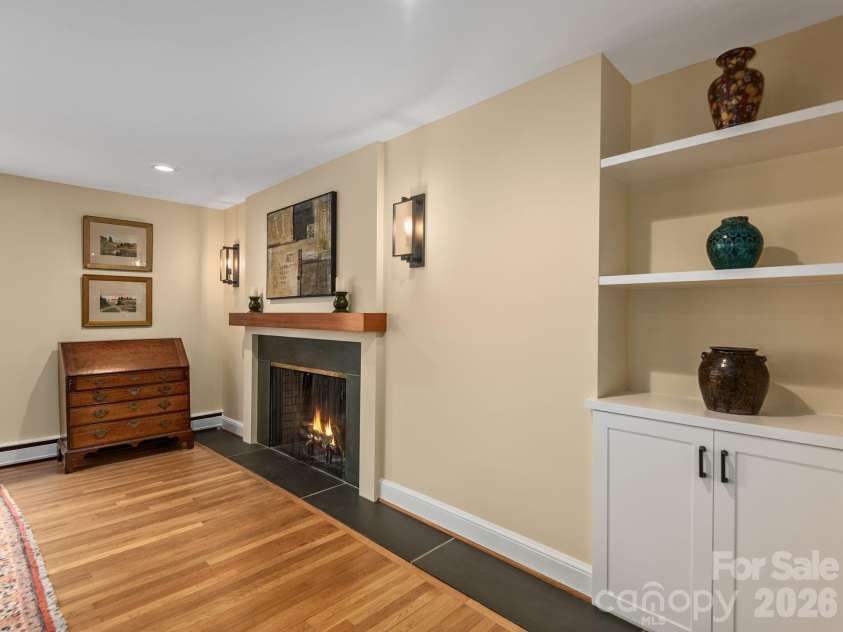 65 Cliff Drive, Laurel Park, NC 28739.  MLS# CAR4394753, YatesRealty ID 39607. Timeless details shine in this inviting living room