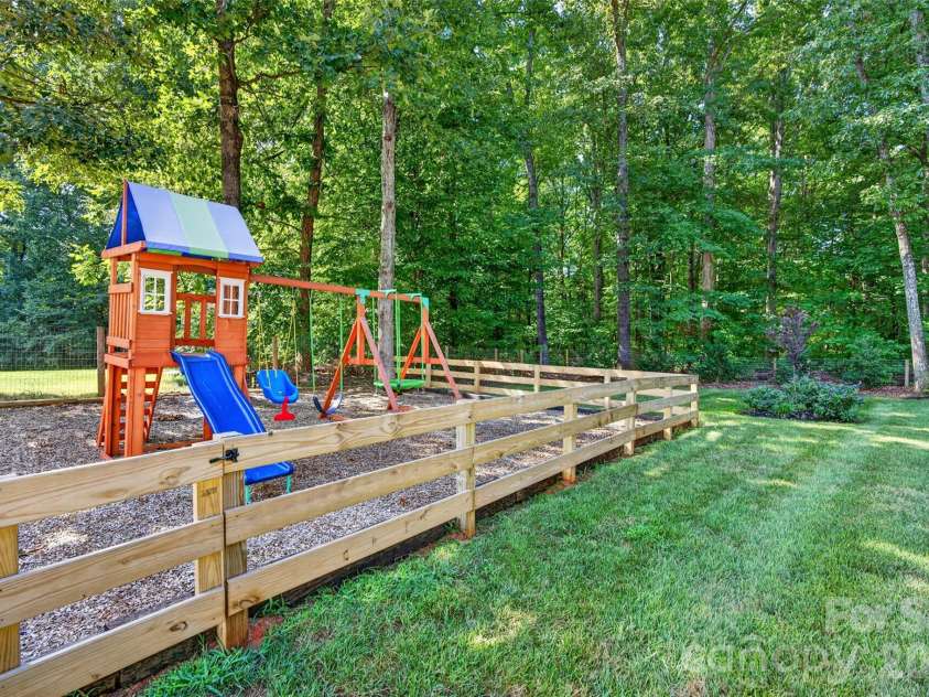 147 Ty Lin Way, Troutman, NC 28166.  MLS# CAR4407100, YatesRealty ID 39615. Additional fenced in play area
