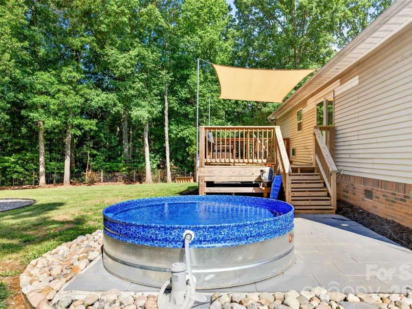 147 Ty Lin Way, Troutman, NC 28166.  MLS# CAR4407100, YatesRealty ID 39615. Deck and Patio area