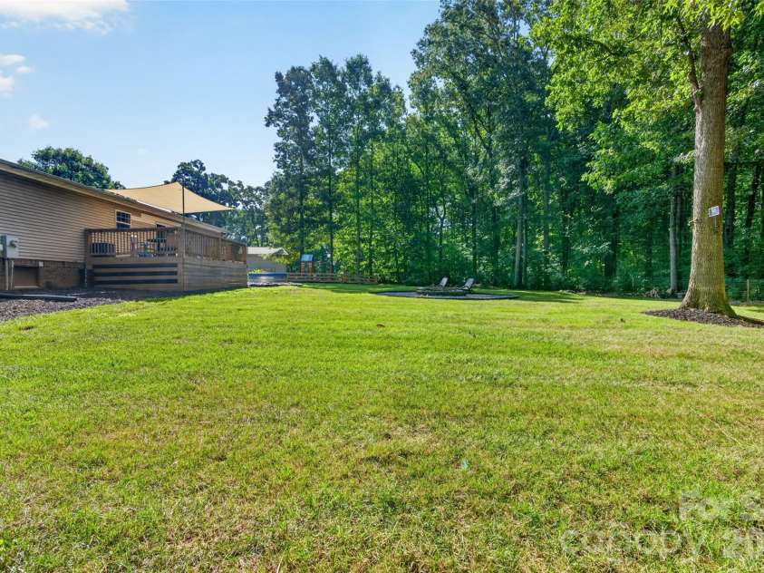 147 Ty Lin Way, Troutman, NC 28166.  MLS# CAR4407100, YatesRealty ID 39615. Large Backyard