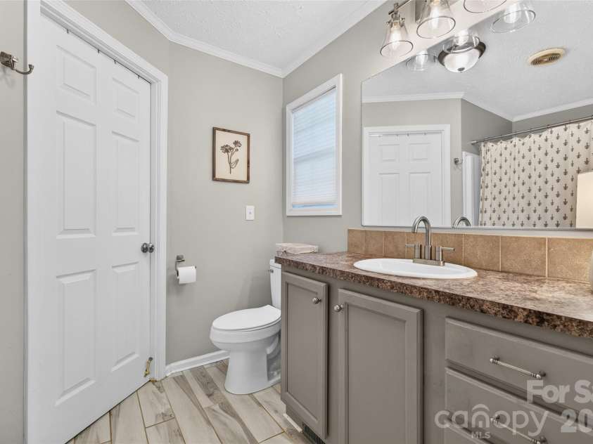 147 Ty Lin Way, Troutman, NC 28166.  MLS# CAR4407100, YatesRealty ID 39615. Primary On Suite