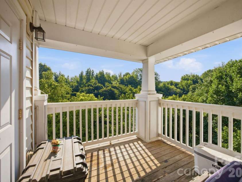 17257 Doe Valley Court, Cornelius, NC 28031.  MLS# CAR4405908, YatesRealty ID 39617. Cover Deck overlooking tons of trees