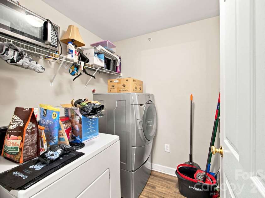 17257 Doe Valley Court, Cornelius, NC 28031.  MLS# CAR4405908, YatesRealty ID 39617. Large Laundry Room & Space for Pantry Storage