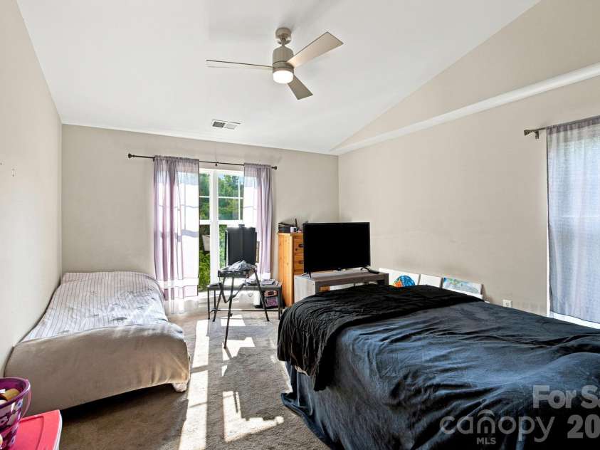 17257 Doe Valley Court, Cornelius, NC 28031.  MLS# CAR4405908, YatesRealty ID 39617. Primary Bedroom w/ Vaulted Ceilings
