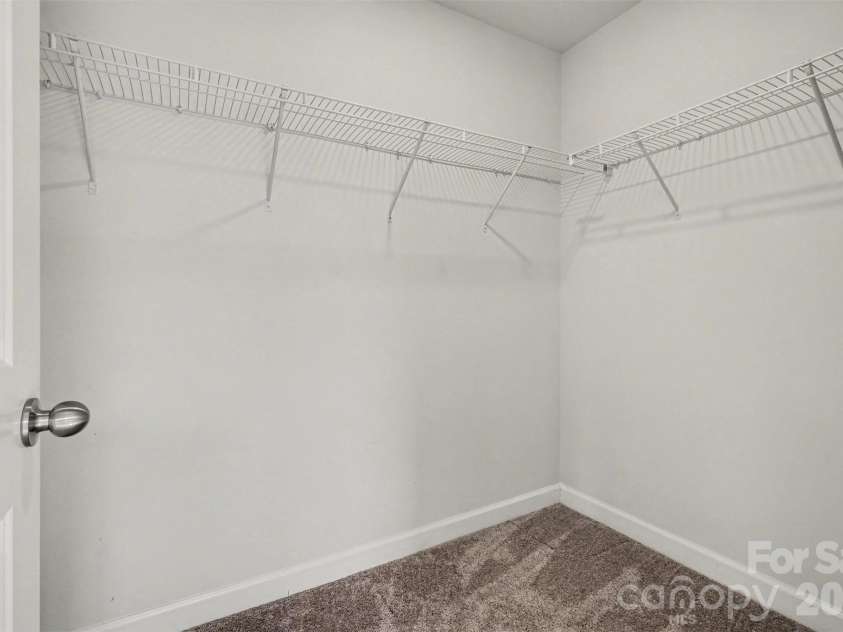 14510 Grundys Way, Davidson, NC 28036.  MLS# CAR4347789, YatesRealty ID 3962. Generously sized primary closet