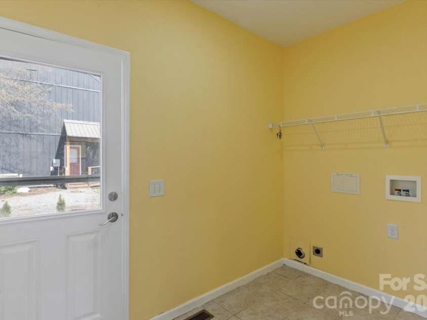 84 Poplar Street, Brevard, NC 28712.  MLS# CAR4403421, YatesRealty ID 39627. 