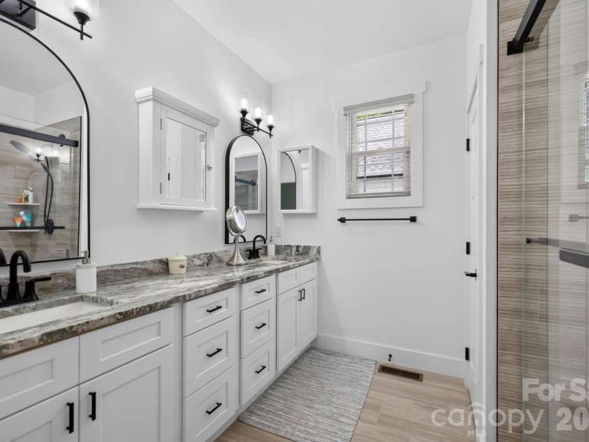 29 Banner Cottages Lane, Mills River, NC 28759.  MLS# CAR4406330, YatesRealty ID 39636. Primary bath with Dual sinks