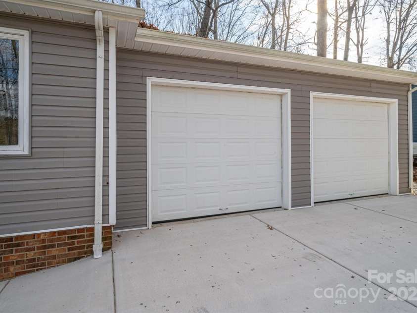 1934 Hickory Hills Drive, Denver, NC 28037.  MLS# CAR4209236, YatesRealty ID 3964. Double garage added in 2022