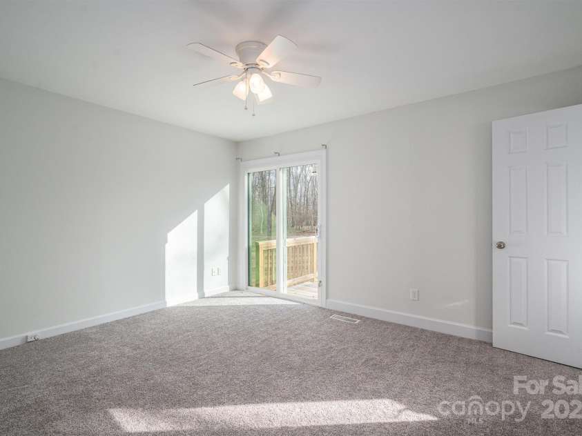 1934 Hickory Hills Drive, Denver, NC 28037.  MLS# CAR4209236, YatesRealty ID 3964. Primary bedroom with deck.