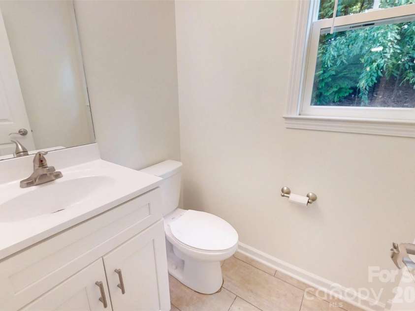 1017 Baldwin Commons Drive, Arden, NC 28704.  MLS# CAR4407131, YatesRealty ID 39643. Half Bath
