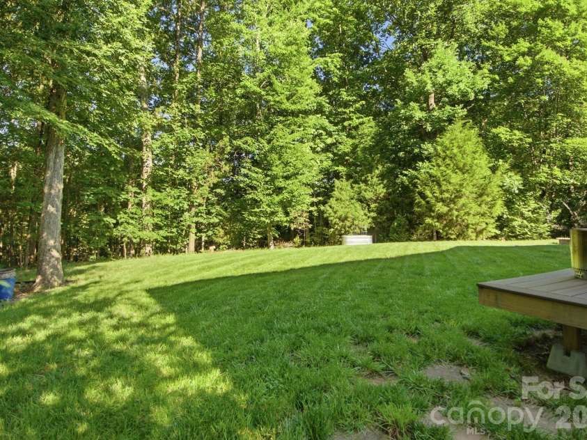 8306 Early Bird Way, Charlotte, NC 28227.  MLS# CAR4405672, YatesRealty ID 39644. Backyard