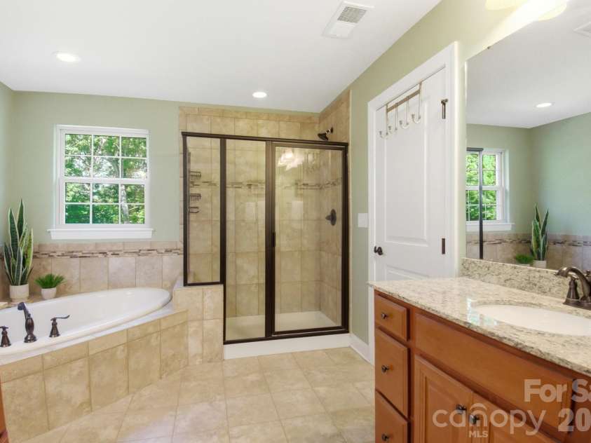 8306 Early Bird Way, Charlotte, NC 28227.  MLS# CAR4405672, YatesRealty ID 39644. Primary Bathroom