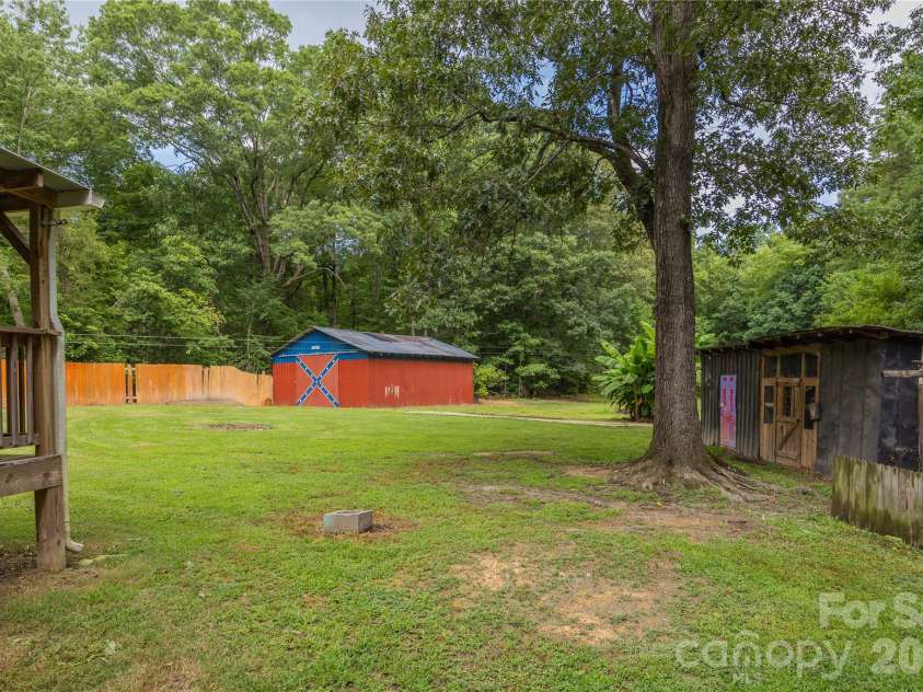 703 Chapel Hill Church Road, Denton, NC 27239.  MLS# CAR4407033, YatesRealty ID 39648. Back Yard
