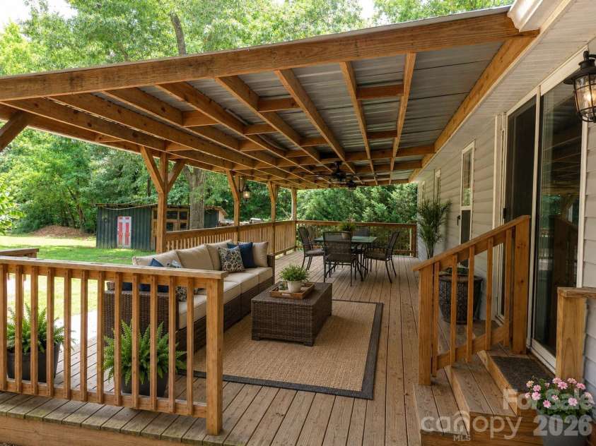 703 Chapel Hill Church Road, Denton, NC 27239.  MLS# CAR4407033, YatesRealty ID 39648. Covered Back porch, virtually decorated