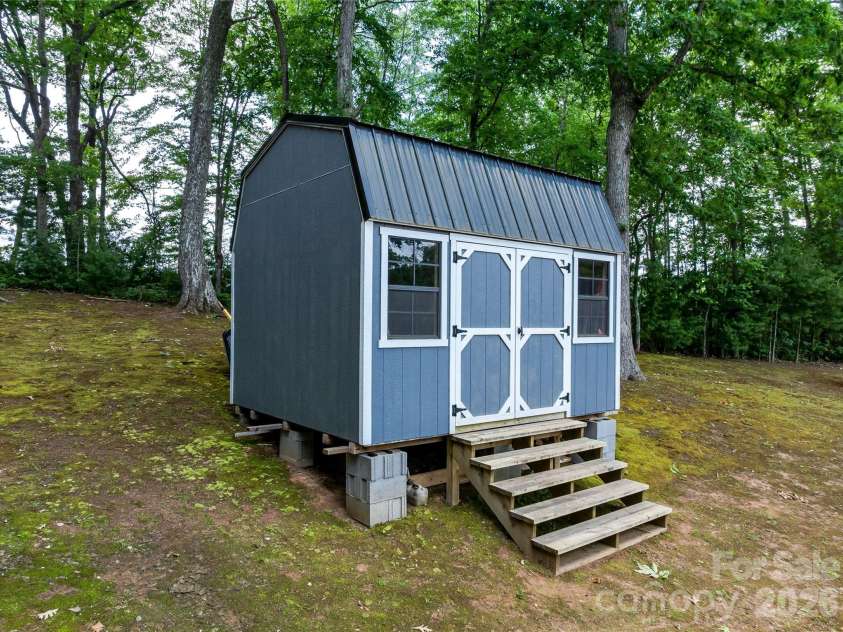 143 Fox Grape Hollow Road, Mars Hill, NC 28754.  MLS# CAR4397871, YatesRealty ID 39652. Shed has great views and is in good condition. Could be renovated as usable space.
