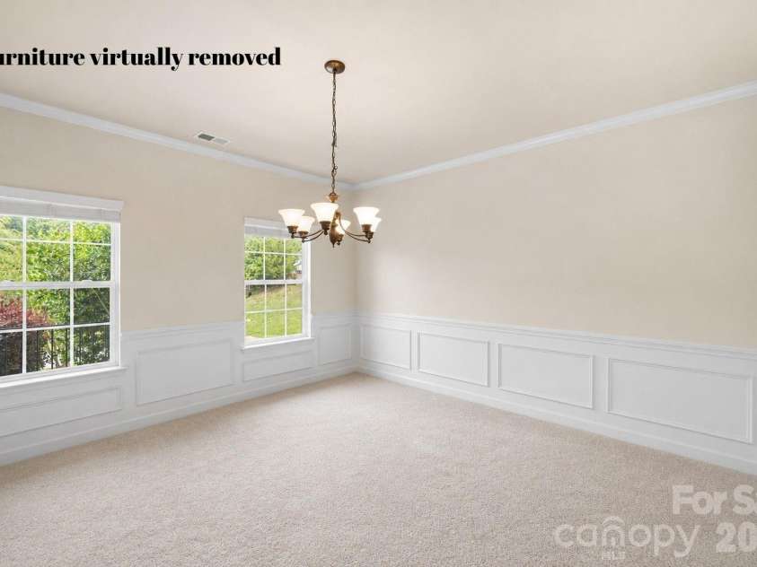 1086 Arrowhead Drive, Concord, NC 28025.  MLS# CAR4397947, YatesRealty ID 39653. Dining room with furniture virtually removed