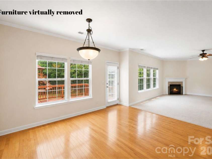 1086 Arrowhead Drive, Concord, NC 28025.  MLS# CAR4397947, YatesRealty ID 39653. Eat in kitchen with furniture virtually removed