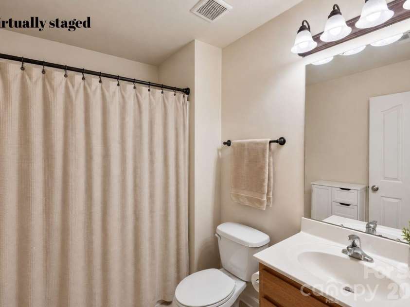 1086 Arrowhead Drive, Concord, NC 28025.  MLS# CAR4397947, YatesRealty ID 39653. Full bathroom upstairs virtually decorated