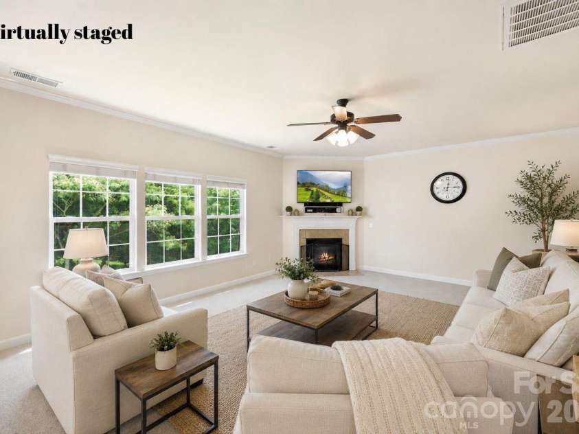 1086 Arrowhead Drive, Concord, NC 28025.  MLS# CAR4397947, YatesRealty ID 39653. Living room virtually staged