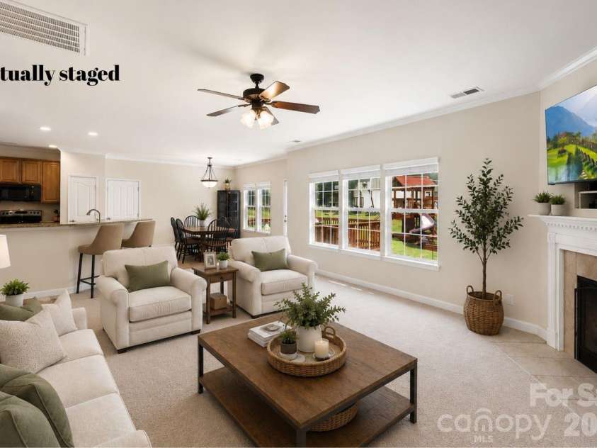1086 Arrowhead Drive, Concord, NC 28025.  MLS# CAR4397947, YatesRealty ID 39653. Living room virtually staged