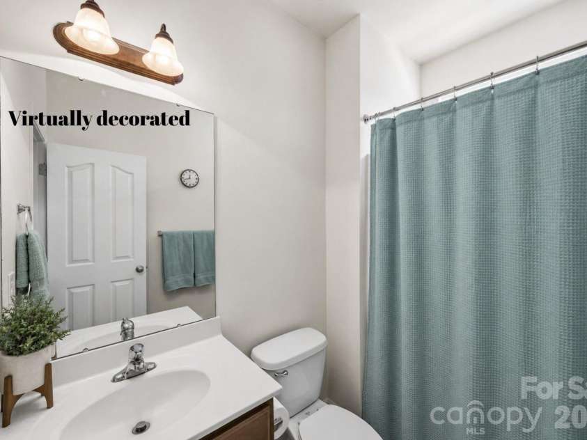 1086 Arrowhead Drive, Concord, NC 28025.  MLS# CAR4397947, YatesRealty ID 39653. Main level full bathoom virtually decorated