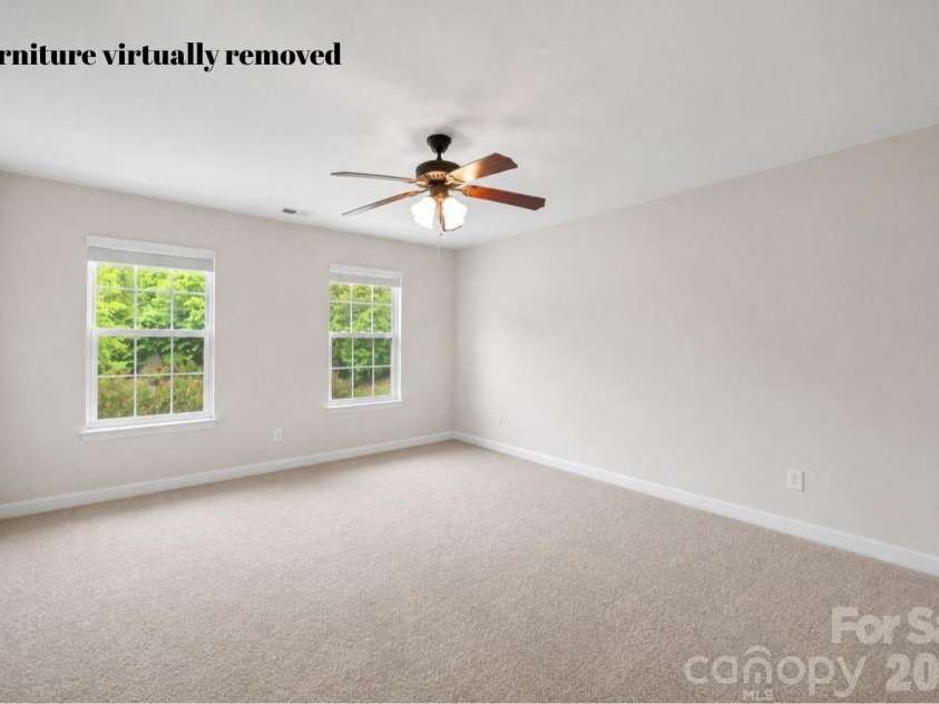 1086 Arrowhead Drive, Concord, NC 28025.  MLS# CAR4397947, YatesRealty ID 39653. Secondary bedroom #1 with furniture virtually removed