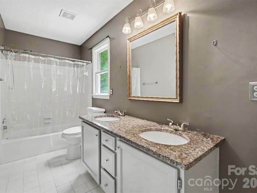 519 Raintree Drive, Matthews, NC 28104.  MLS# CAR4407047, YatesRealty ID 39665. 