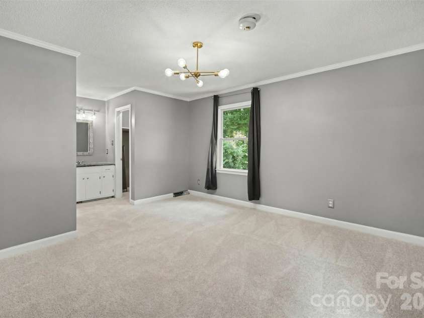 519 Raintree Drive, Matthews, NC 28104.  MLS# CAR4407047, YatesRealty ID 39665. 