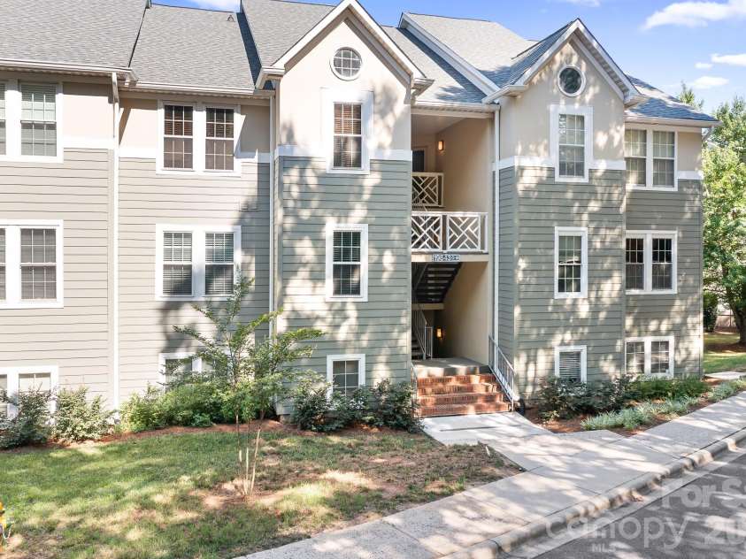19843 Henderson Road, Cornelius, NC 28031.  MLS# CAR4400549, YatesRealty ID 39667. Front View - 2nd Level Walk Up - End Unit - Close Parallel Parking