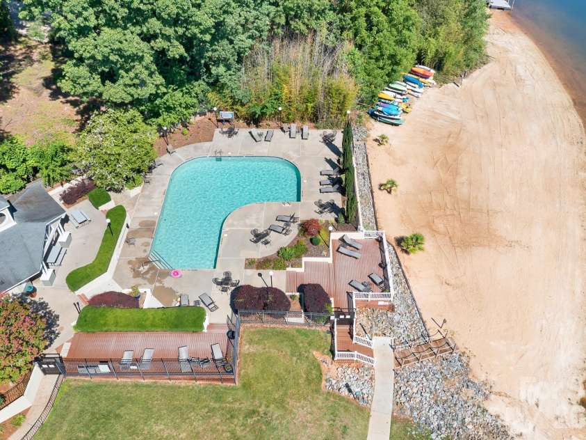 19843 Henderson Road, Cornelius, NC 28031.  MLS# CAR4400549, YatesRealty ID 39667. It Doesn't Get Much Better Than This- Pool, Beach and Lake Norman!