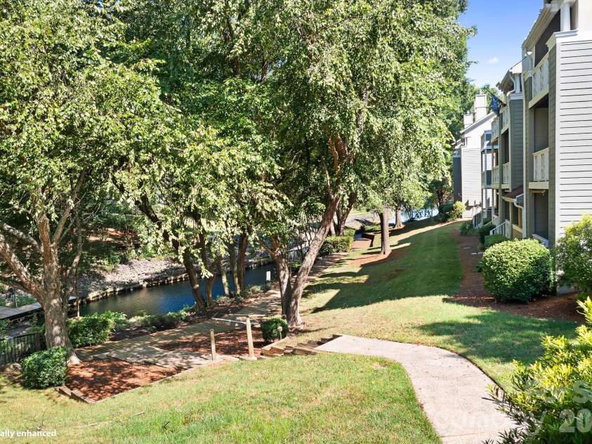 19843 Henderson Road, Cornelius, NC 28031.  MLS# CAR4400549, YatesRealty ID 39667. View Form The Covered Deck - North
