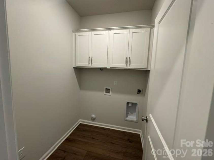 204 Rodeo Drive, Shelby, NC 28150.  MLS# CAR4346538, YatesRealty ID 39670. Laundry with cabinets
