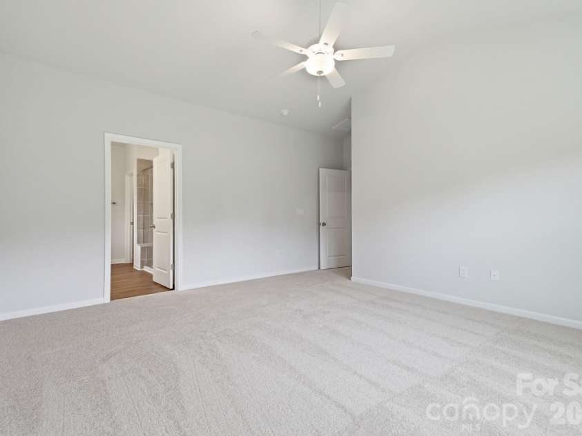 204 Rodeo Drive, Shelby, NC 28150.  MLS# CAR4346538, YatesRealty ID 39670. Primary Bedroom into bathroom