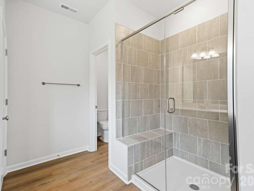 204 Rodeo Drive, Shelby, NC 28150.  MLS# CAR4346538, YatesRealty ID 39670. Primary tiled shower with seat