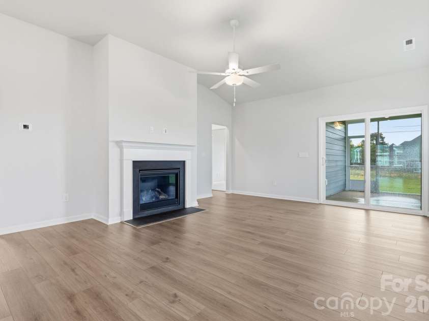 205 Rodeo Drive, Shelby, NC 28150.  MLS# CAR4342609, YatesRealty ID 39672. Great room showing fireplace