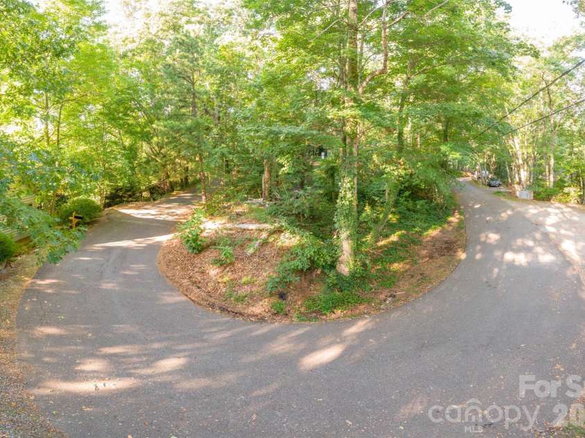174 Laurel Lane, Lake Lure, NC 28746.  MLS# CAR4402159, YatesRealty ID 39675. 