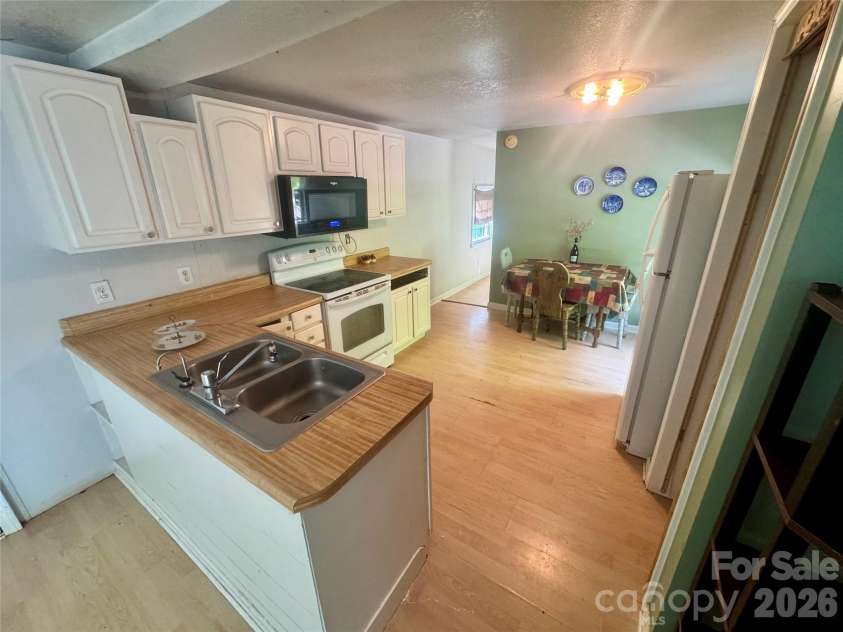 174 Laurel Lane, Lake Lure, NC 28746.  MLS# CAR4402159, YatesRealty ID 39675. 