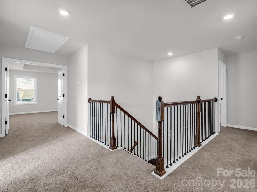 23 Silverthorne Court, Hendersonville, NC 28792.  MLS# CAR4406094, YatesRealty ID 39682. Upper level with large open halls