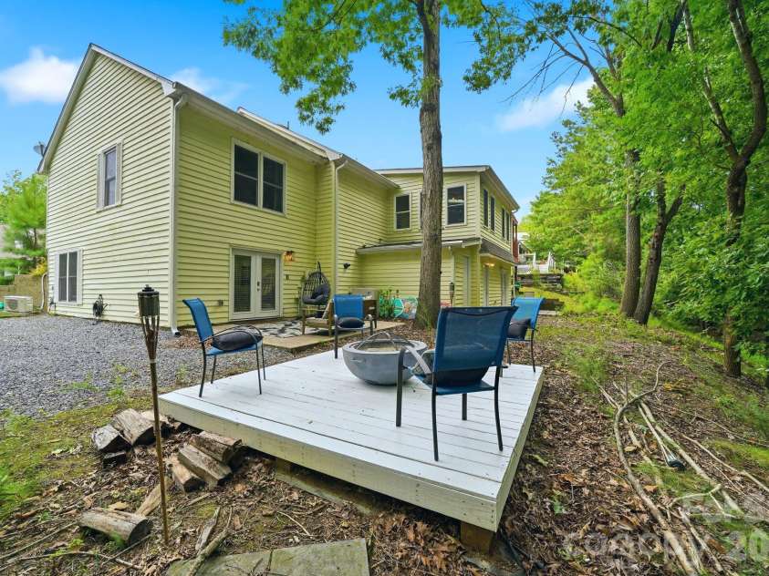 12017 Baywoods Drive, Tega Cay, SC 29708.  MLS# CAR4407015, YatesRealty ID 39706. Back patio and firepit area