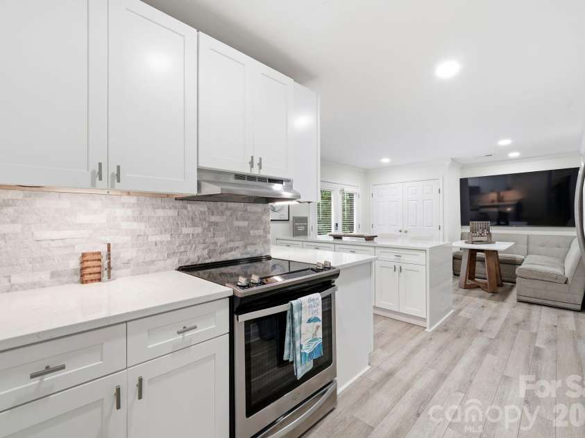 12017 Baywoods Drive, Tega Cay, SC 29708.  MLS# CAR4407015, YatesRealty ID 39706. Lower level full kitchen