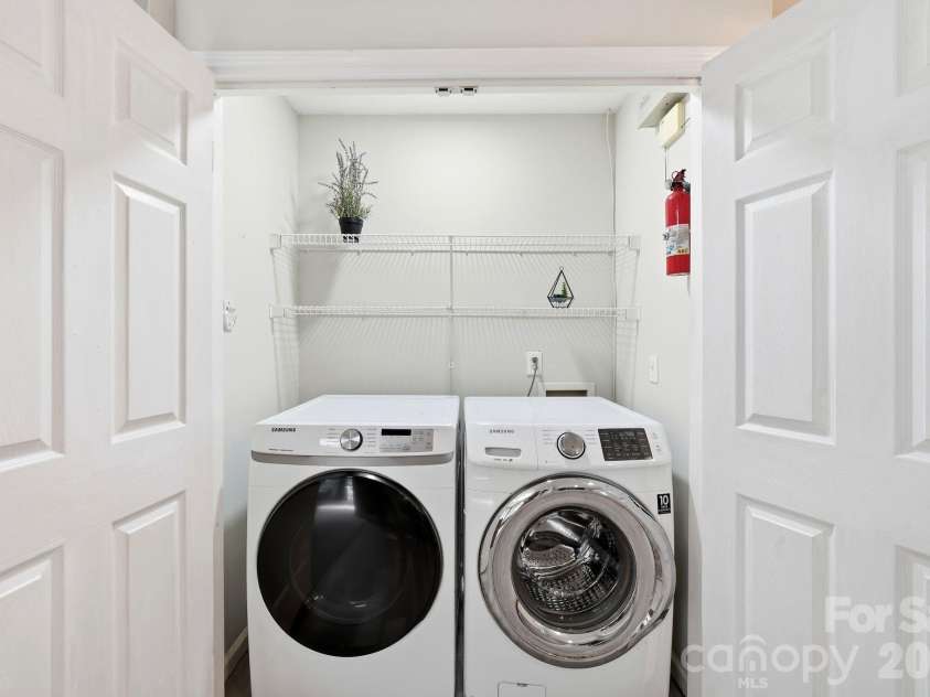 12017 Baywoods Drive, Tega Cay, SC 29708.  MLS# CAR4407015, YatesRealty ID 39706. Lower level laundry