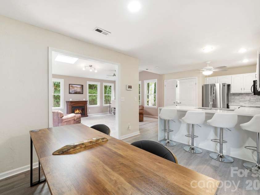 12017 Baywoods Drive, Tega Cay, SC 29708.  MLS# CAR4407015, YatesRealty ID 39706. Main level kitchen and dining