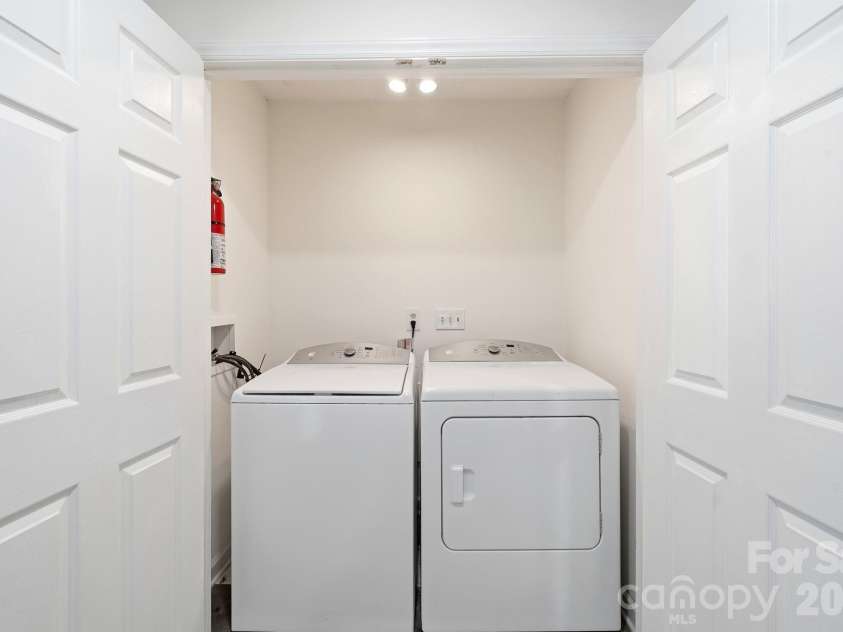 12017 Baywoods Drive, Tega Cay, SC 29708.  MLS# CAR4407015, YatesRealty ID 39706. Main level laundry