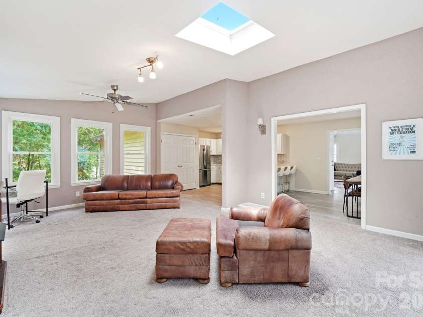 12017 Baywoods Drive, Tega Cay, SC 29708.  MLS# CAR4407015, YatesRealty ID 39706. Main level sunroom