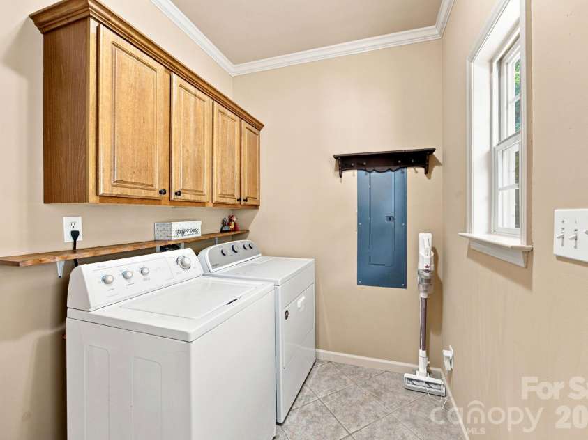 7073 Ridgeway Road, Stanley, NC 28164.  MLS# CAR4406988, YatesRealty ID 39719. Laundry on 1st floor is just off the side entry